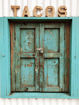 Blue Window To Taco Booth