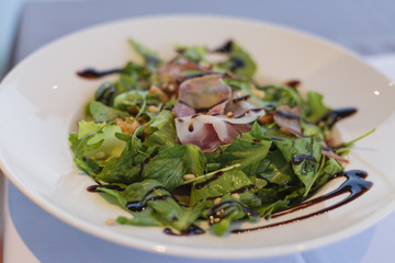 Fresh salad with smoked meat