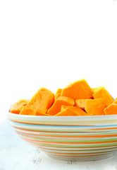 Orange pumpkin cut into pieces