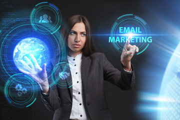 The concept of business, technology, the Internet and the network. A young entrepreneur working on a virtual screen of the future and sees the inscription: Email marketing