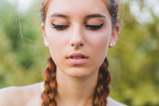 Beautiful Young Redhead with Braids
