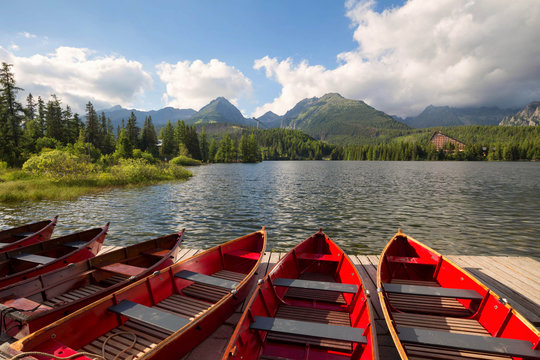 Panorama mountain lake Strbske Pleso in the Tatra mountains. Summers colors and boat for swimming © Rochu_2008