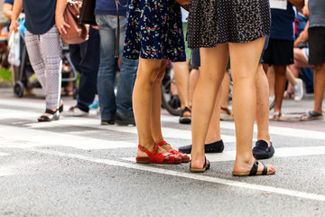 People in street waiting