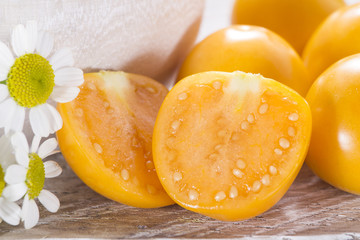 fresh uchuva fruits, The plant known as uchuva, uvilla, aguaymanto or ushun is a herbaceous plant belonging to the family solanaceae (Physalis peruviana)