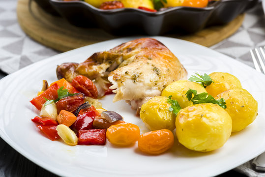 roast chicken with potatoes