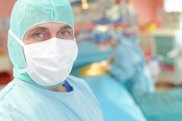 portrait of a surgeon in front of the operation room