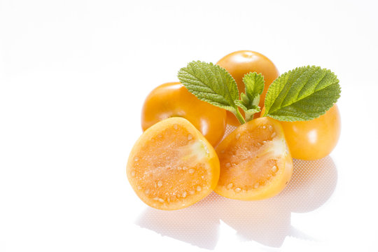 fresh uchuva fruits, The plant known as uchuva, uvilla, aguaymanto or ushun is a herbaceous plant belonging to the family solanaceae (Physalis peruviana)