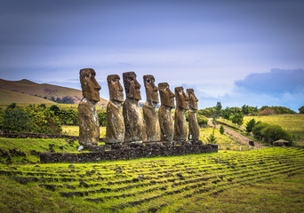 Ahu Akivi, Easter Island - July 11, 2017: Moai altar of Ahu Akivi - obrazy, fototapety, plakaty
