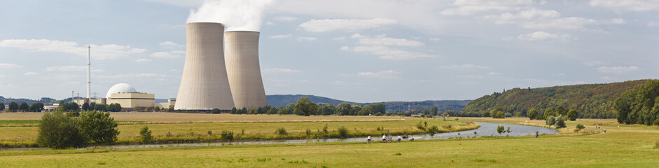 Nuclear Power Station In River Landscape
