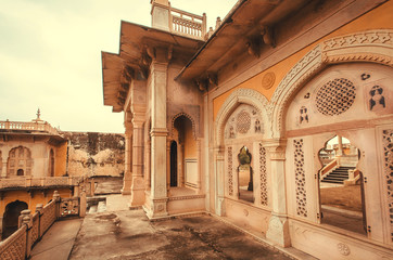 Patterns on entrance of Gaitore Cenotaphs, royal cremation monuments of the Kachhwaha Rajputs with typical Rajasthani Carvings, Jaipur, India.
