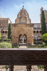 Fototapeta na wymiar Mudejar cloister of Guadalupe Monastery. Iron fence door detail