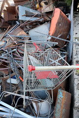 shopping cart in recycling of material for disposal