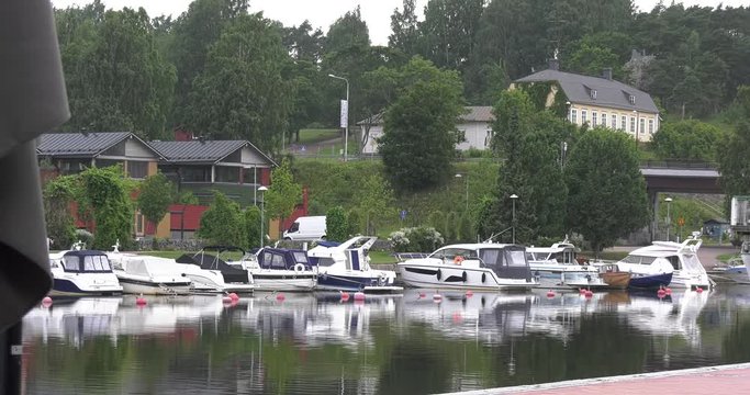 4K high quality video footage of medieval Porvoo old town on river Porvoonjoki, cathedral, river embankment, boats, old warehouses, area 50 km east of Helsinki, capital of Finland in northern Europe