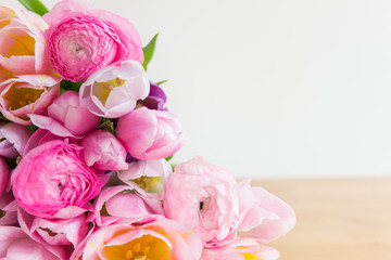 Bunch of Colorful Tulips and Pink Ranunculus Buttercup Flowers