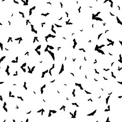 Seammles pattern swarm of bats on the white background.