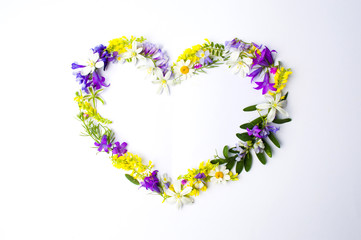 Heart shape made of colorful wildflowers