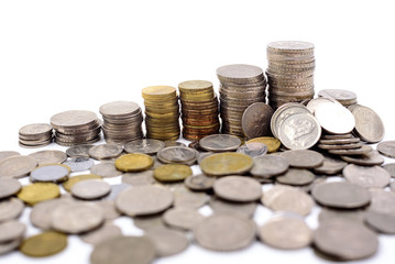 coins stacked in a white background