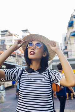 Portrait of a Beautiful Asian Woman With Sunglasses