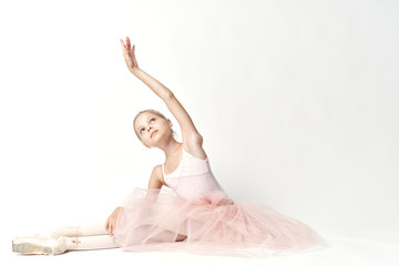 Fototapeta premium 1465000 girl ballerina is warming up