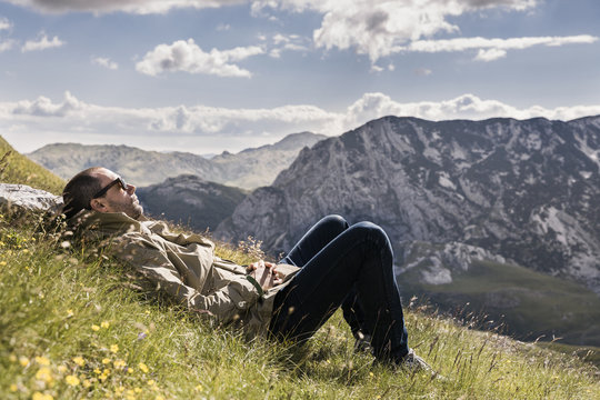 Young man resting in nature, Durmitor, Montenegro