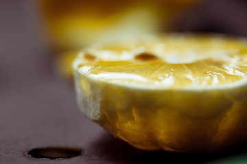 low key lemon macro, with a fresh drop of juice