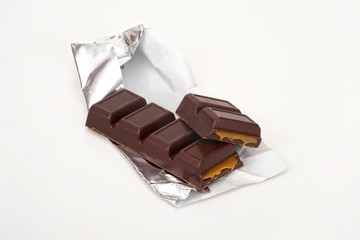 Chocolate bar with filling isolated on white background