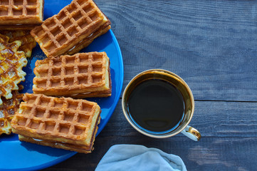 Coffee and Waffle on blue plate