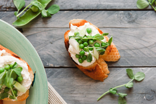 Crostini with spring vegetables and ricotta.