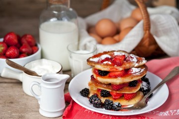 delicious pancakes with yogurt and berries