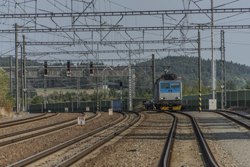 Obraz premium Trains in Olbramovice station with platforms