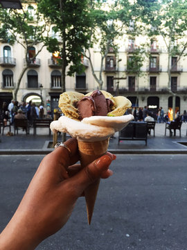 Rose petal gelato in a waffle cone