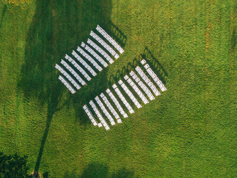 Chairs set up for an outdoor wedding