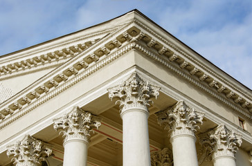 Courthouse. Supreme court. Ornate columns and a pediment in a style of classical architecture. Legal and order. Classic style. Justice. Law. Legal system. Court hearing. Lawsuit. Court proceeding