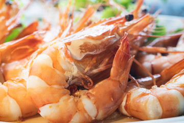 Grilled shrimps on plate with vagetable , selective focus