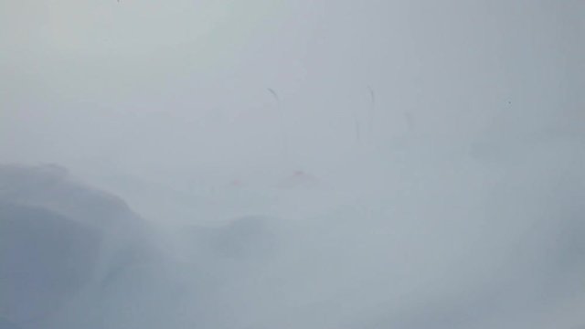 A snow storm annihilating snow equipment. The storm was caught on cam.
