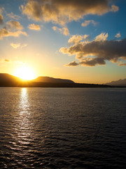 Fototapeta premium Sunrise at the mountain, at sea heading to Bali