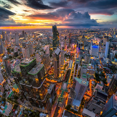 Aerial view of Bangkok buildings, Bangkok city downtown with sunset sky, Transaction beautiful road...