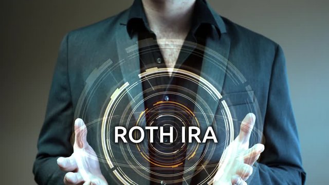 A businessman holds up a futuristic glowing aura reading ROTH IRA