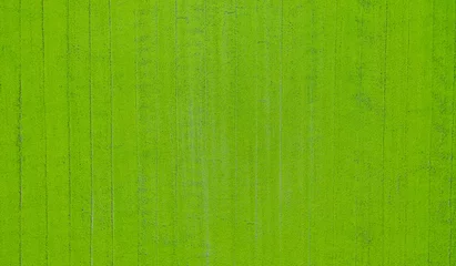 Fotobehang Aerial  view from flying drone of  Field rice  with landscape green pattern nature background © waranyu