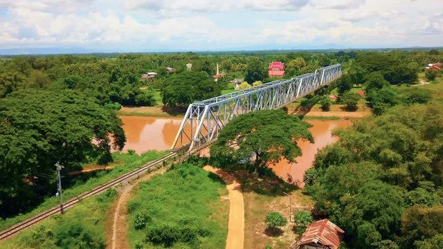 Aerial: Train on Forth Rail Bridge in Uttaradit, Thailand