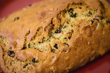 Fresh baked banana bread with fruit and nuts