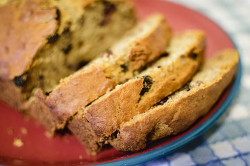 Fresh baked banana bread with fruit and nuts