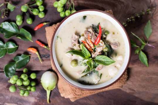 Thai food (Kaeng Khiao Wan),Green curry with pork on wooden background