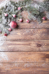 Fototapeta na wymiar Christmas background on wooden
