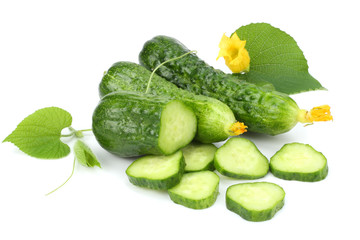 cucumber with sliced cucumber and leaf isolated on white background