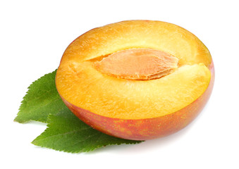 fresh plum fruit with cut plum slices isolated on white background