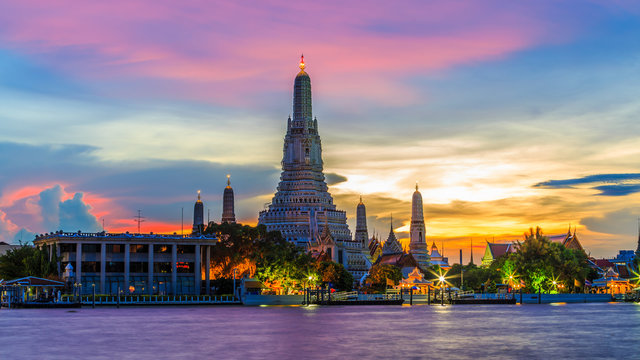 Wat Arun or Temple of Dawn and Chaopraya river in Bangkok City at twilight, Bangkok, Thailand.
