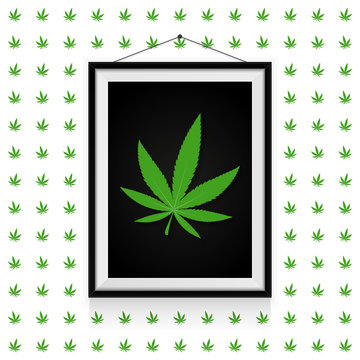 Cannabis leaf in photo frame hanged on the cannabis leaves wall