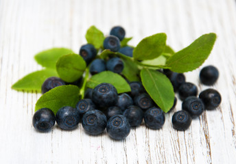 Blueberries on a old wooden background