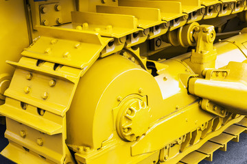 yellow tracks of the tractor or bulldozer. Construction equipment © OlegDoroshin